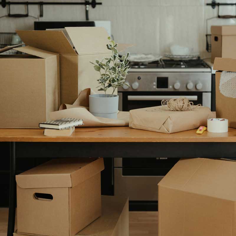 kitchen filled with packed boxes